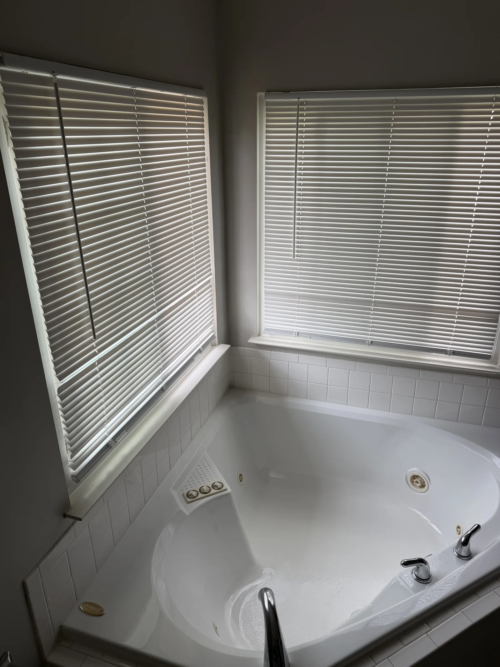 Client-provided photo of a clean white bathtub